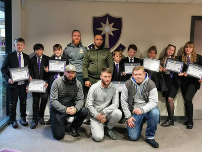 LE Team and students with certificates